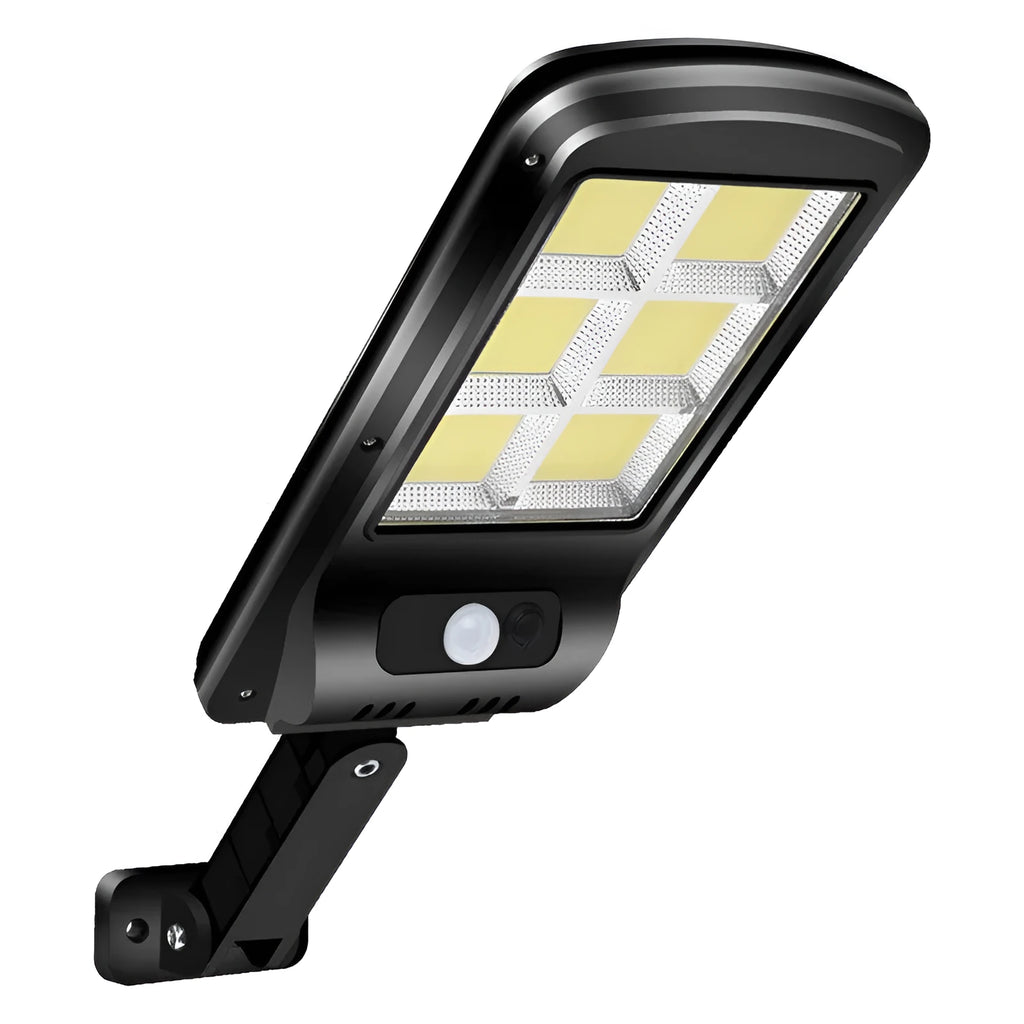 Black solar-powered outdoor security light with motion sensor mounted on a wall.