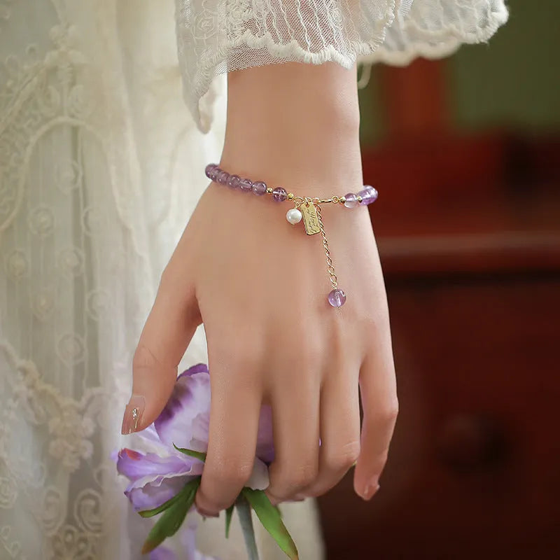 Women's lavender amethyst crystal bracelet with zodiac animal modelling in dark and light colour options