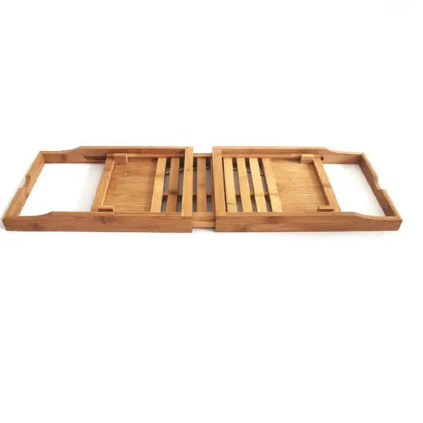 Natural bamboo bathtub caddy frame for organising shampoo and soap on a bathroom desktop.