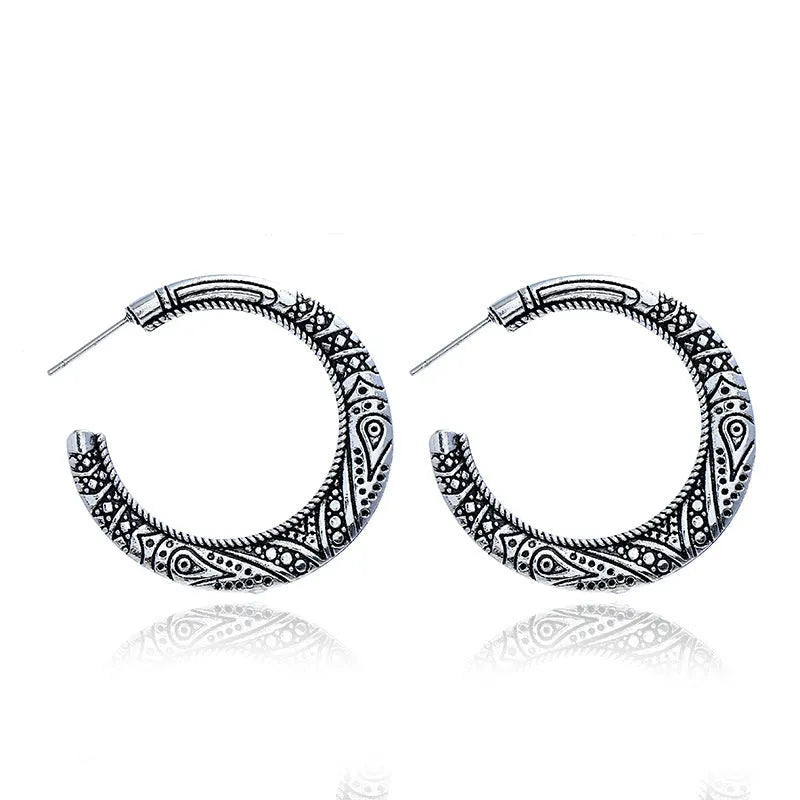 C-shaped alloy earrings with vintage engraving pattern in bronze colour