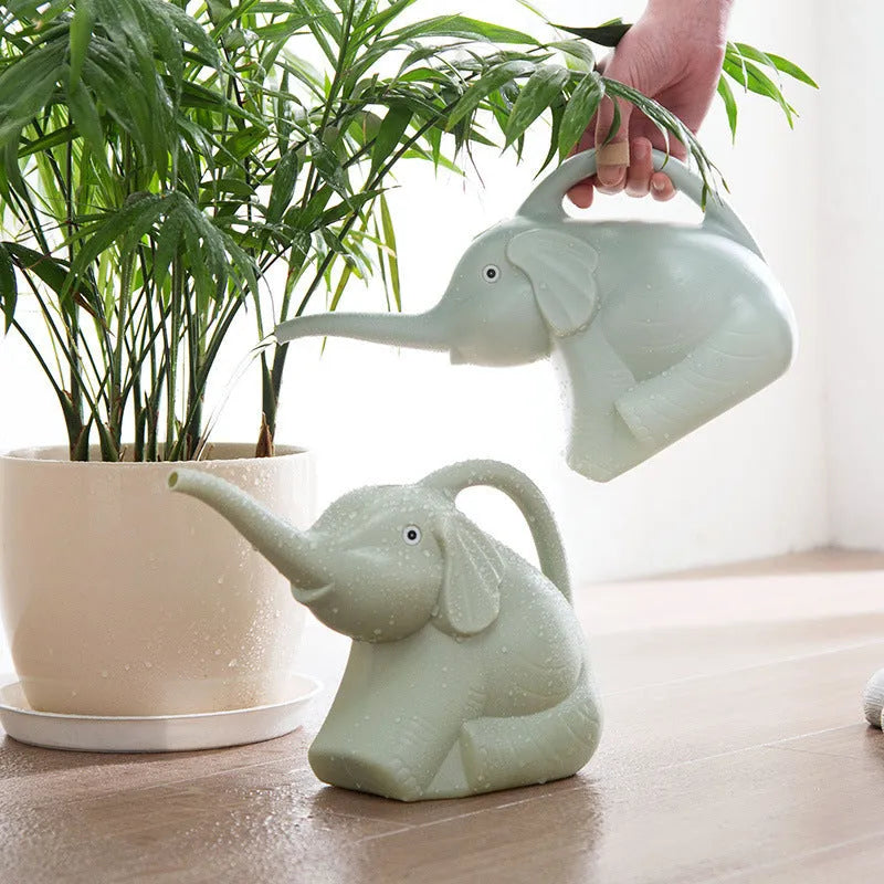Pink elephant-shaped watering can with long nozzle and child-friendly handle for garden watering