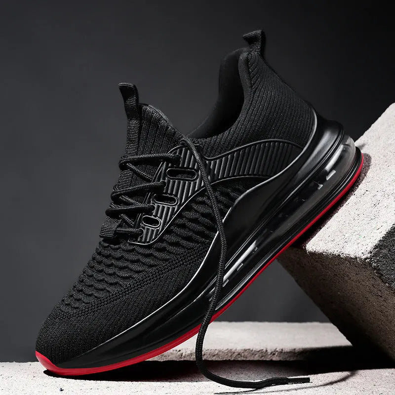 Men's black mesh running shoes with rubber sole and lace-up closure displayed on white background