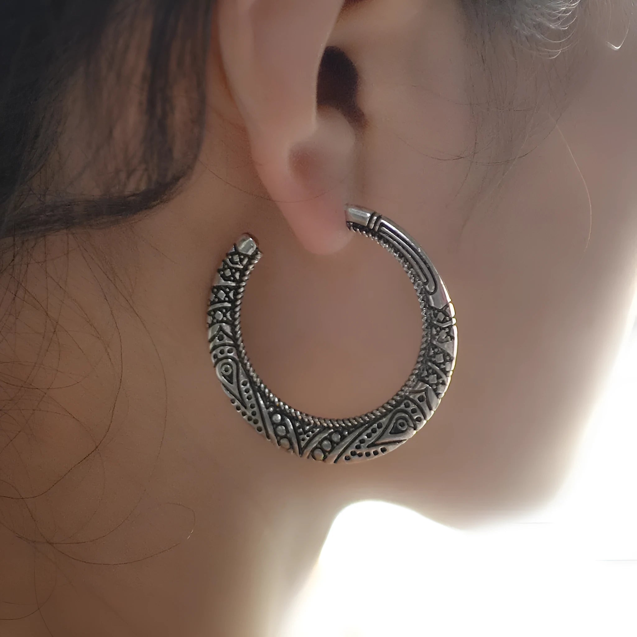 C-shaped alloy earrings with vintage engraving pattern in bronze colour