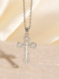 Gold electroplated copper cross necklace with micro inlaid zircon on a 41-50cm O-ring chain.