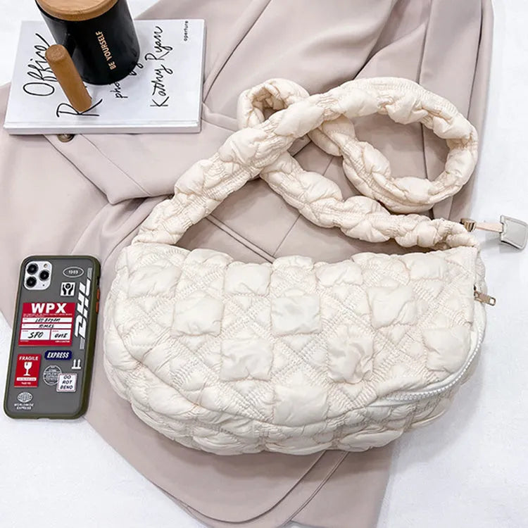 Women's simple nylon cloud underarm messenger bag in a solid colour with an adjustable shoulder strap.