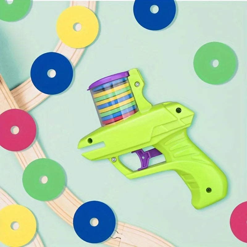 Green battery-free cat toy launcher with foam discs for interactive indoor pet play