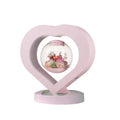 Pink preserved rose ornament with optional Bluetooth audio base and multiple plug options