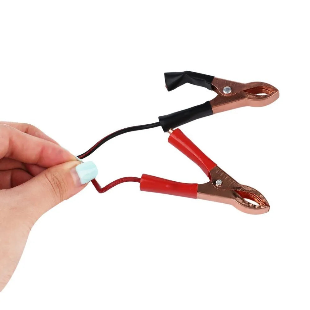 Yellow ABS motorcycle battery charger with alligator clips and 80cm input cable on a white background