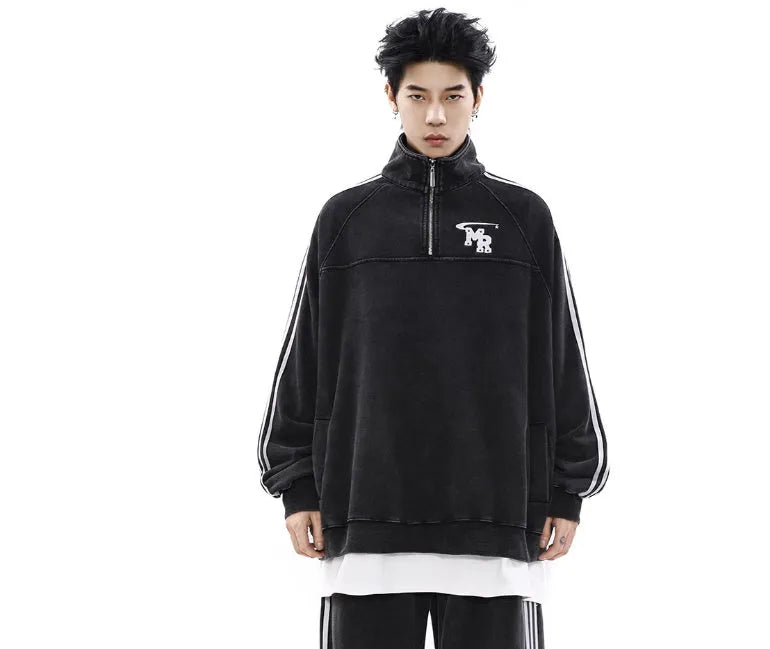 Black Hong Kong style polyester sports hoodie with stand collar and long sleeves on a hanger.