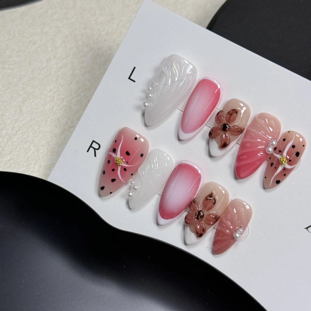 Hand-painted three-dimensional nail patches with embossed candy patterns in almond shape