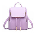 Women's large PU leather backpack in square vertical shape with tassel and magnetic buckle, shown in wine red.