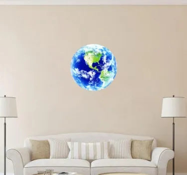 Glow in the dark 3D planet Earth wall sticker on a dark background.