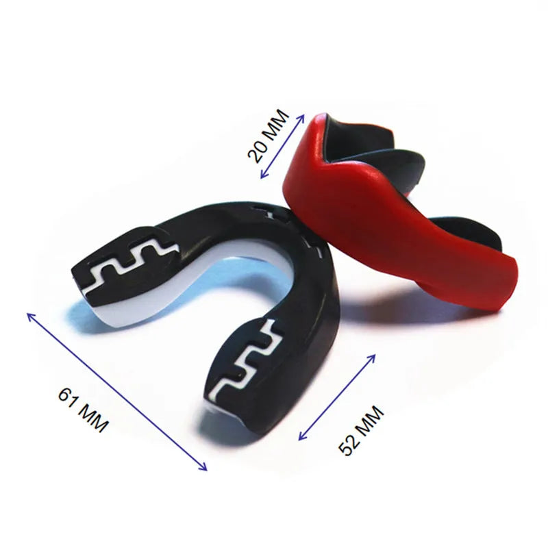 Adult boxing mouthguard with printed tooth design in black and white, for martial arts and fight sports.