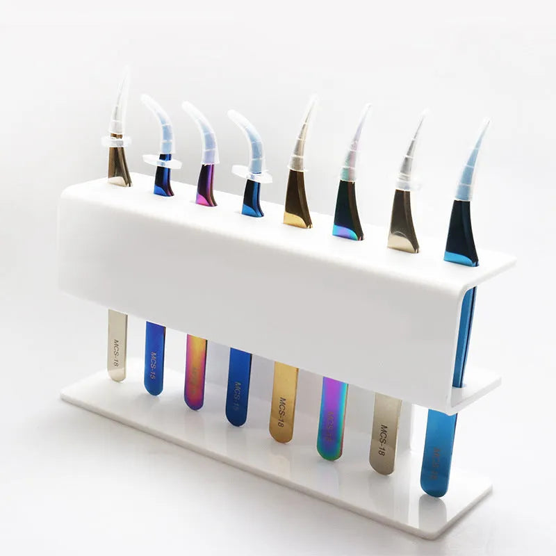 Acrylic tweezers display stand in white finish holding multiple tweezers upright