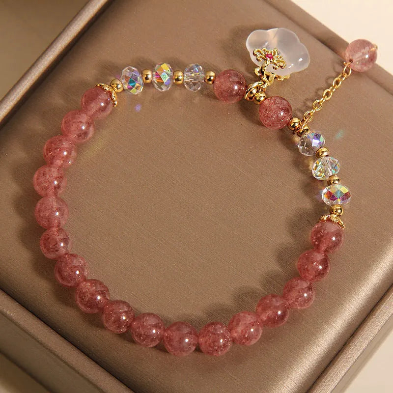 Women's strawberry quartz crystal bracelet with white agate auspicious clouds design