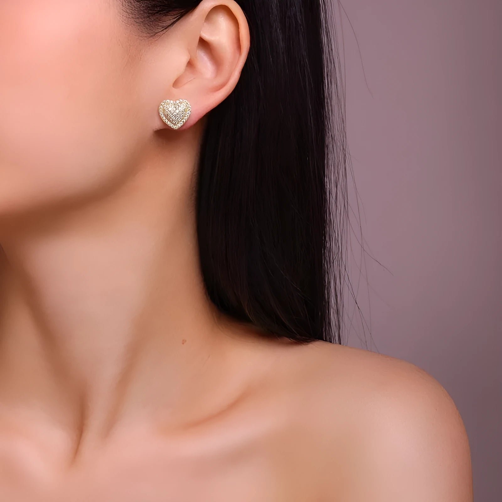 S925 sterling silver heart-shaped stud earrings with golden finish and minimalist design