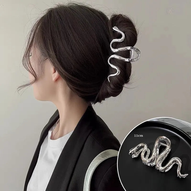 Slytherin serpent design metal hair barrette in silver or black, 10.5cm long.