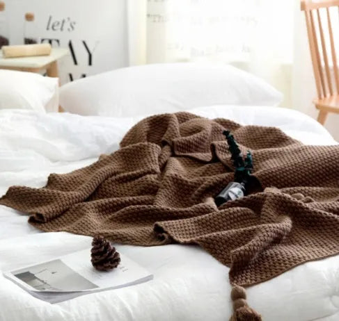 Nordic fringe knit ball acrylic blanket measuring 130×170cm in beige colour
