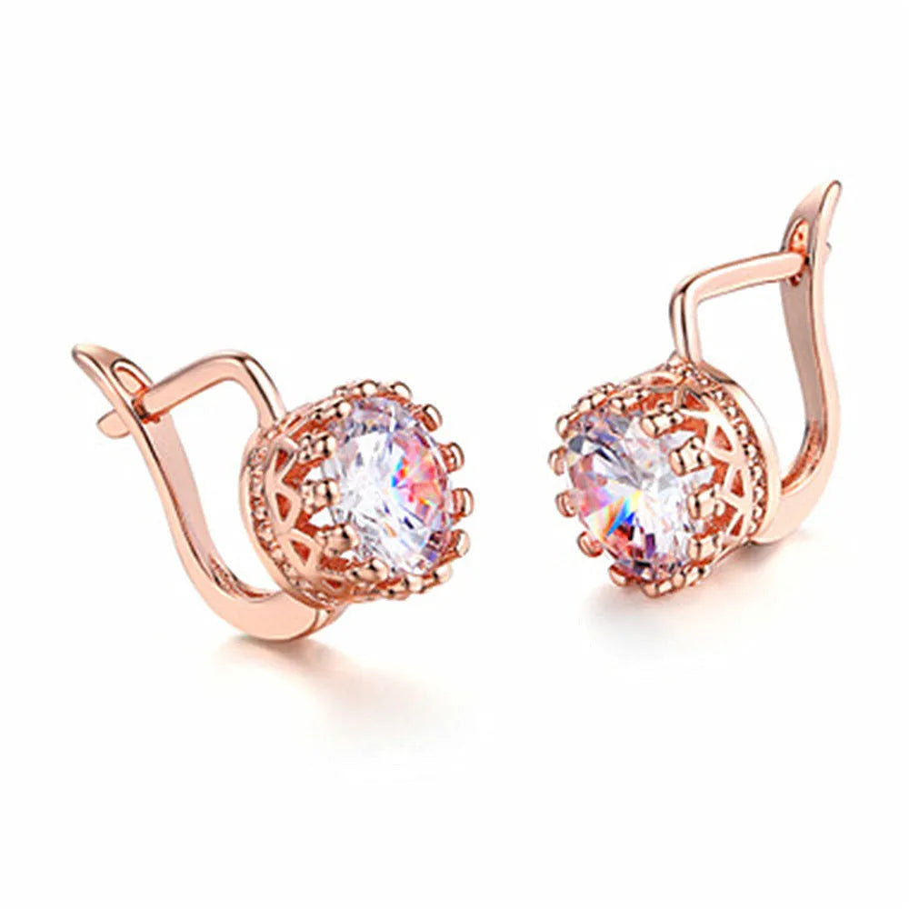 Korean retro crown-shaped clip-on earrings in rose gold and white gold colour finishes on a white background.
