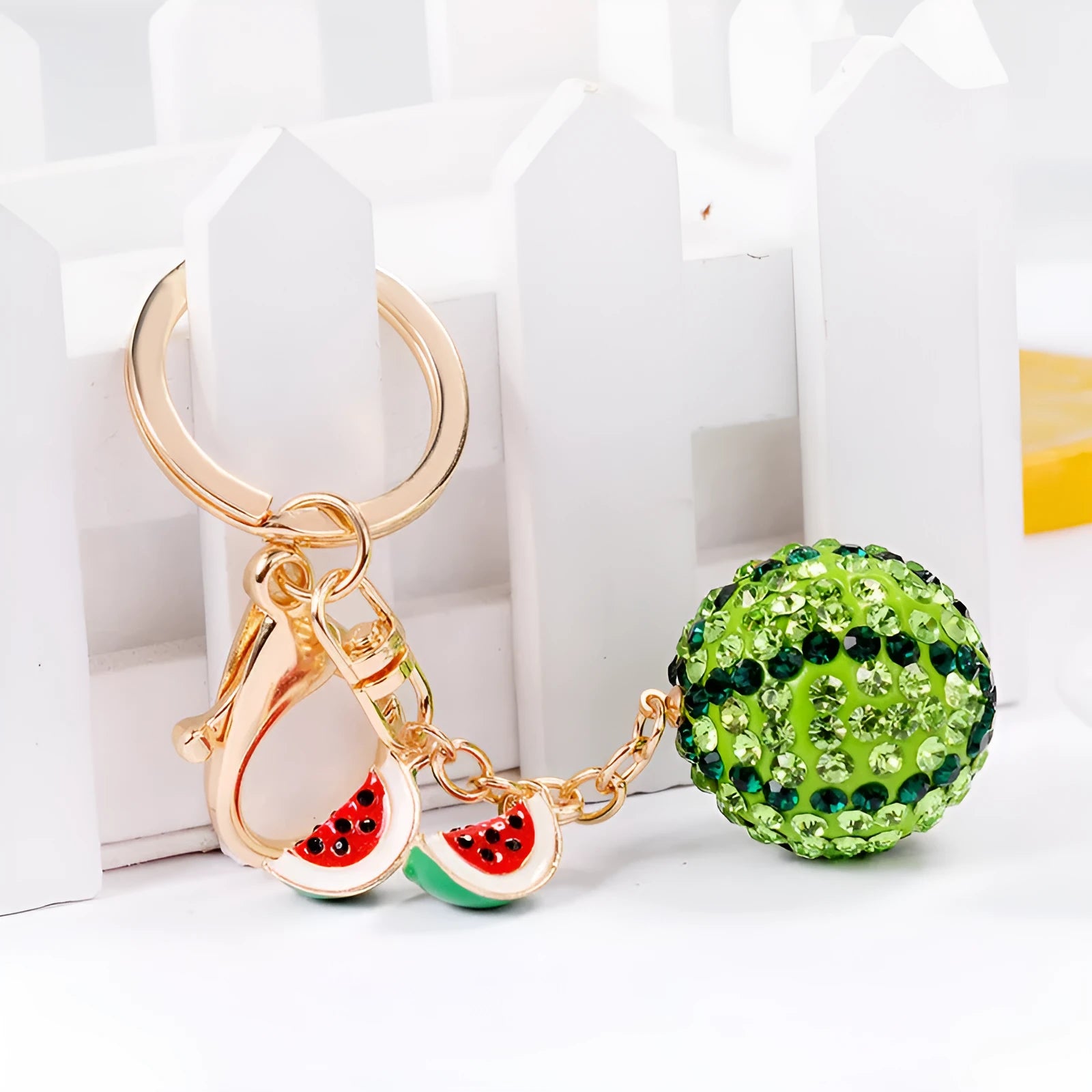 Green watermelon-shaped zinc alloy keychain measuring 12cm long