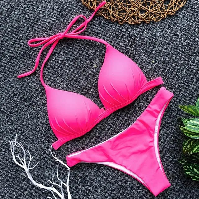 One-piece polyester hanging neck bikini in solid colour with chest pad for swimming