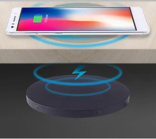 Black 60mm round wireless phone charger for embedded desk and table installation