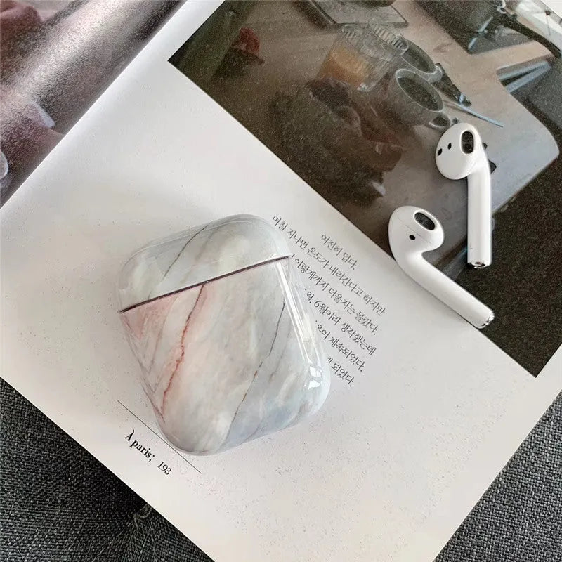 White marble pattern hard PC protective case for Apple AirPods 1 and 2 charging box.