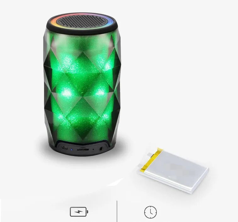 Black crystal diamond cut Coca-Cola can Bluetooth speaker lantern with colourful LED lights illuminated.