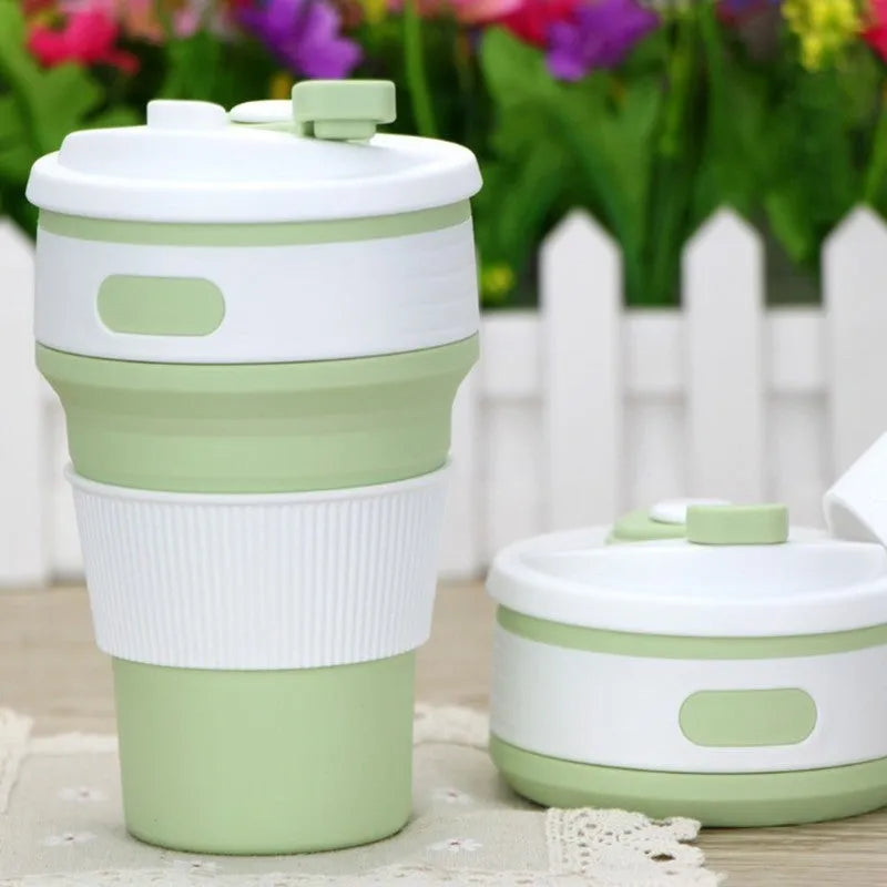 Green collapsible silicone travel cup showing folded and expanded states with leak-proof cover
