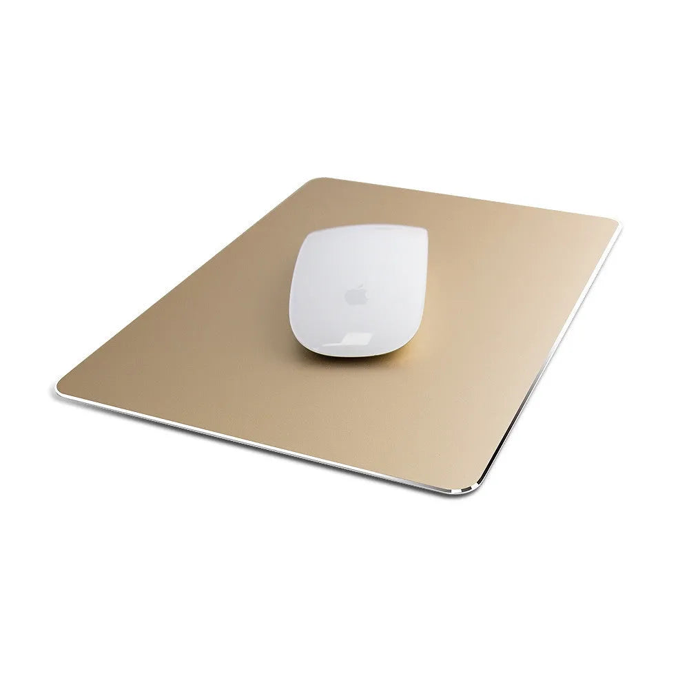 Double-sided aluminium non-slip mouse pad in black with smooth and textured surfaces on a desk