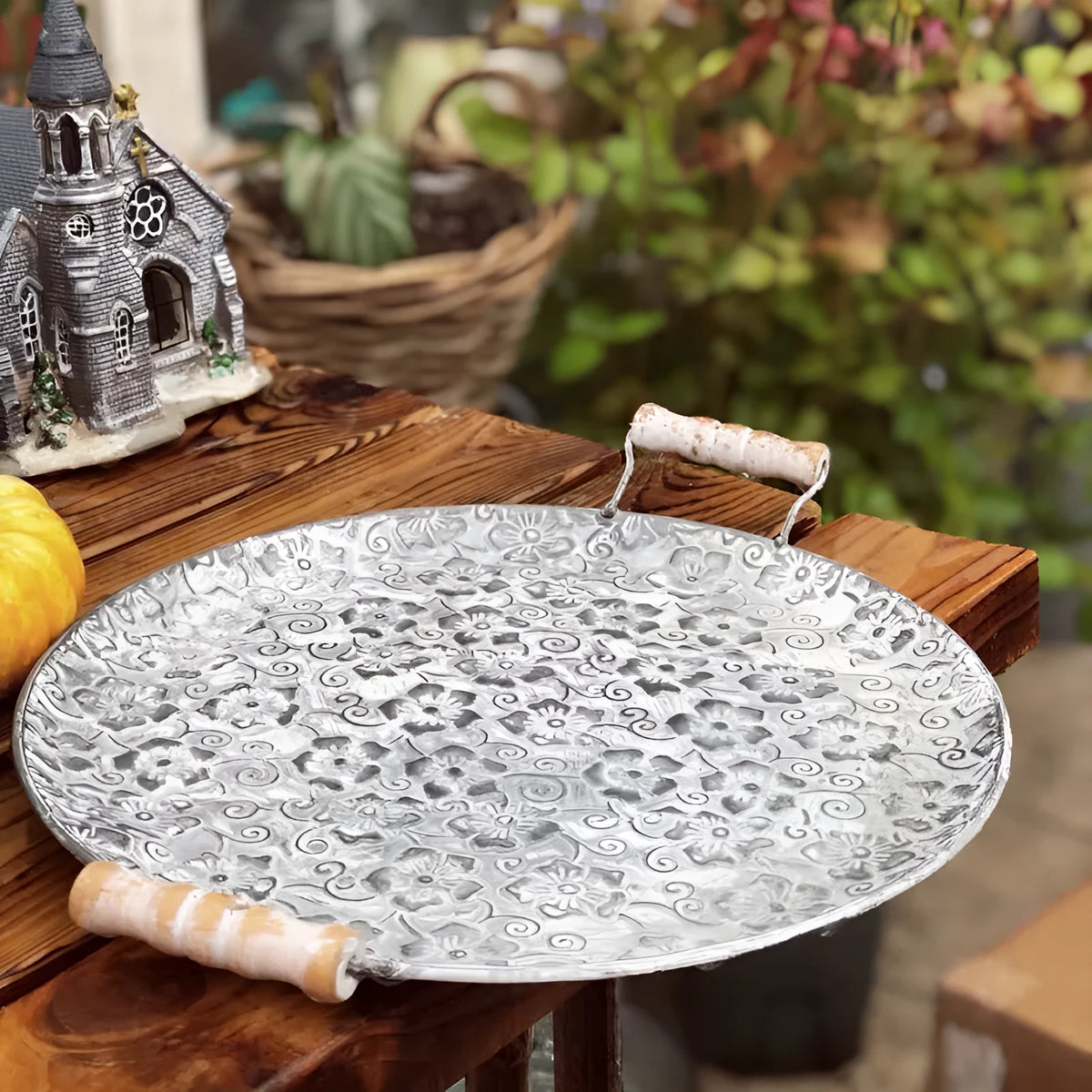 Round wrought iron belt storage tray in two sizes for home organisation.