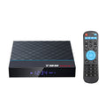 Black T95 Max Plus Android TV box with remote control, showing UK power plug