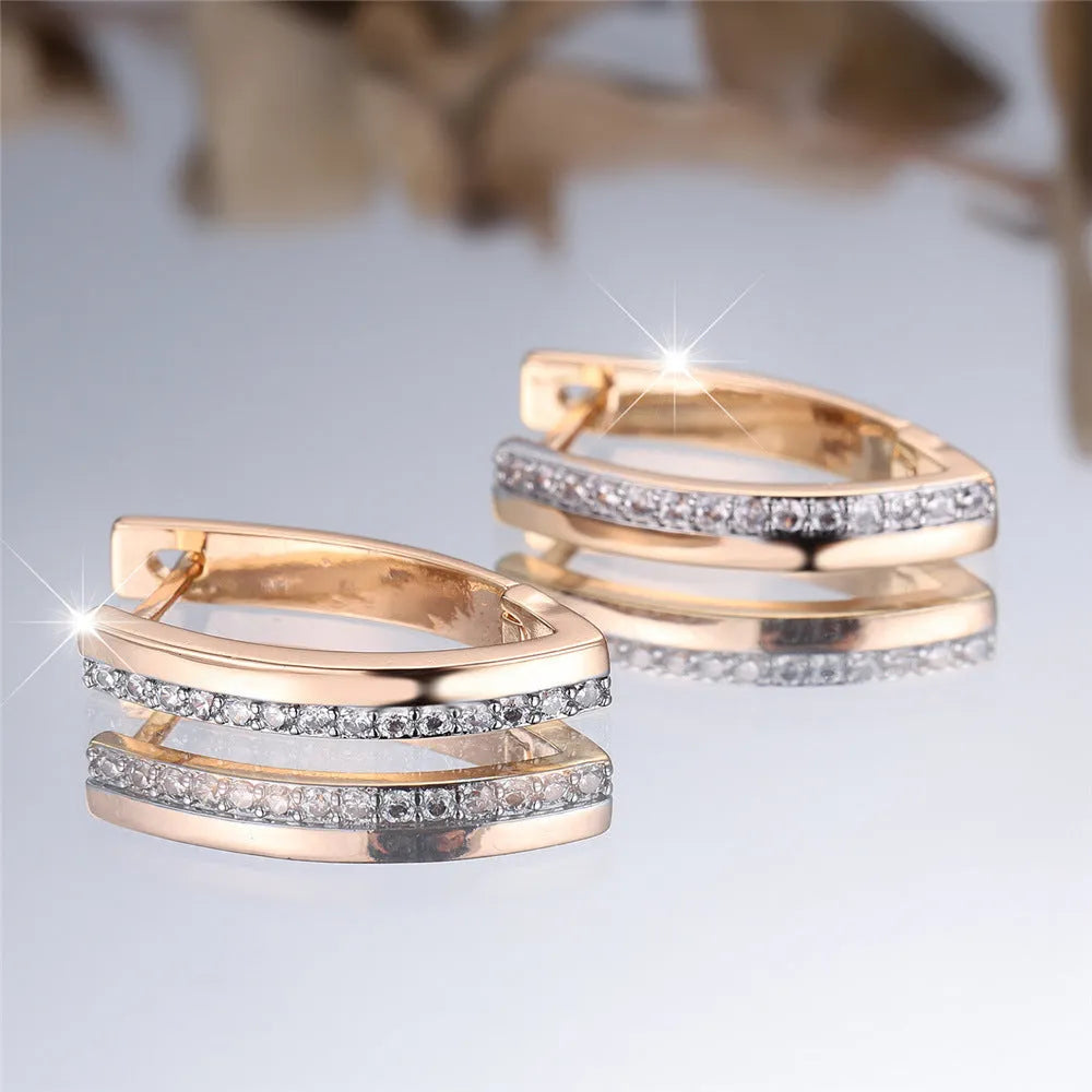 Geometric V-shaped women's ear clips with champagne gold electroplated finish on copper