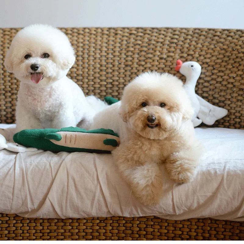 Green plush toy dog with interactive features, showing 35cm length.