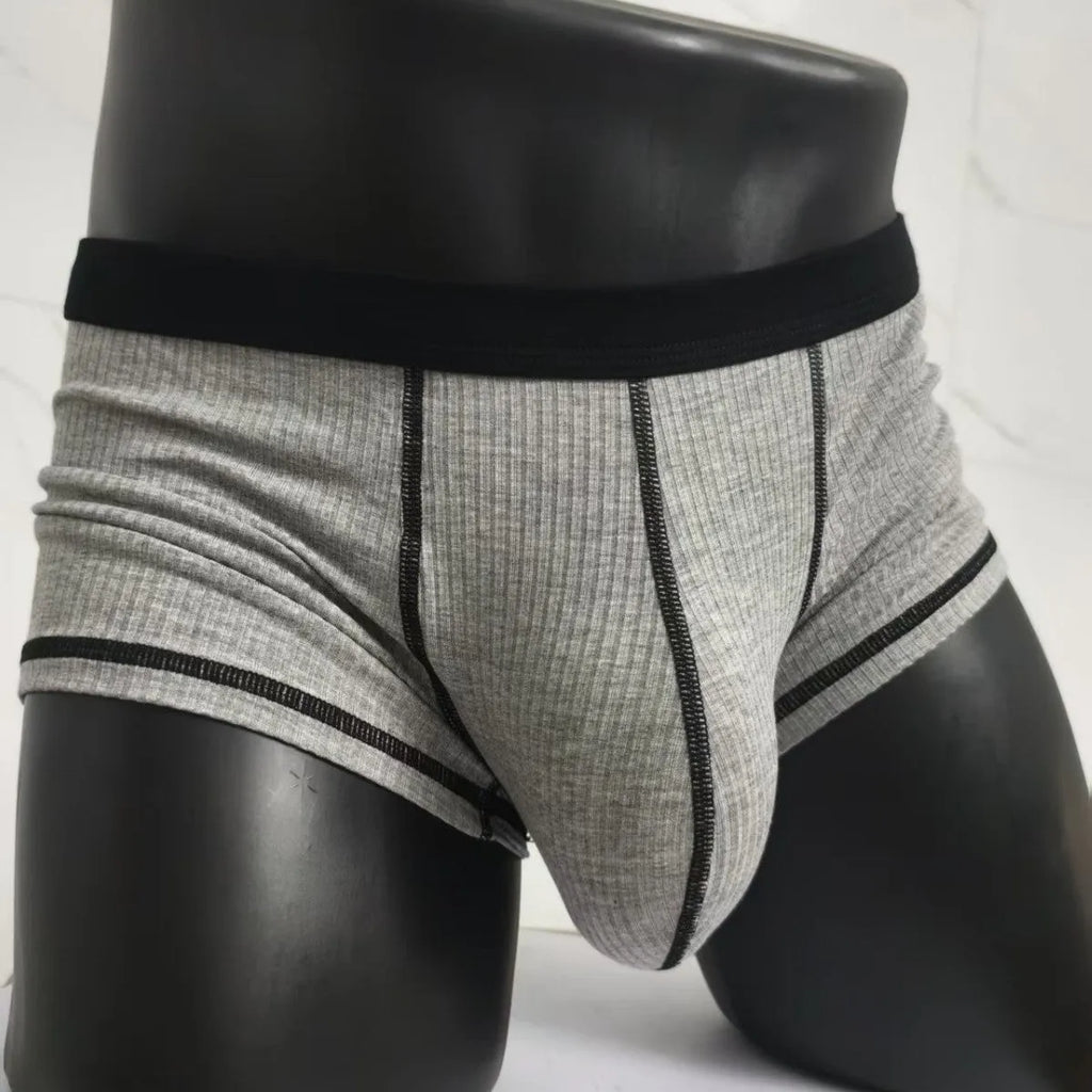 Men's solid colour breathable boxer shorts showing body shaping design in five colour options