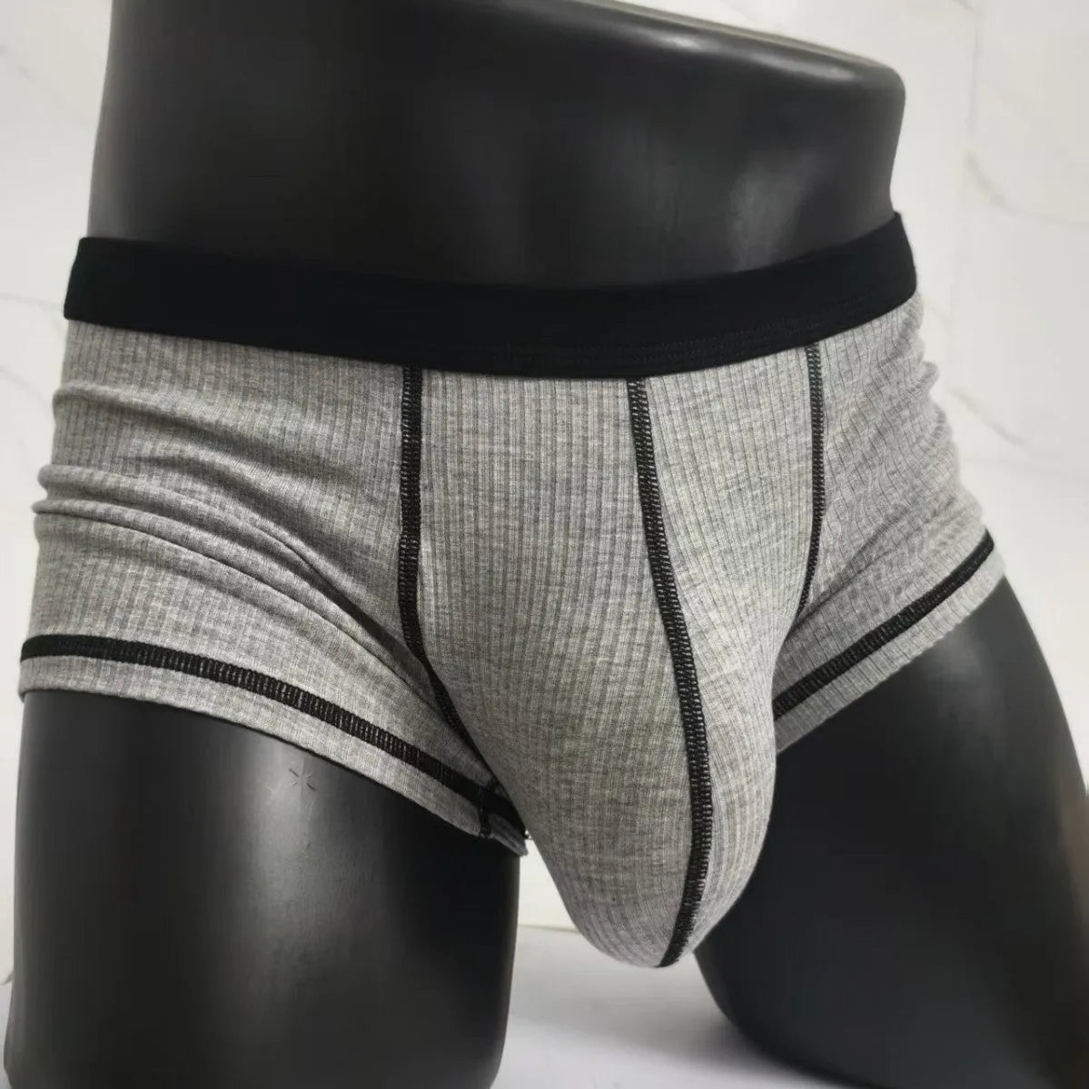 Men's solid colour breathable boxer shorts showing body shaping design in five colour options