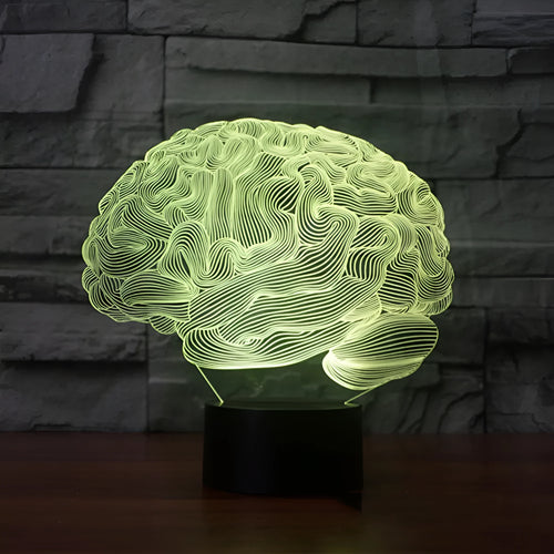 3D acrylic desk lamp with colourful LED illumination and remote control on wooden surface