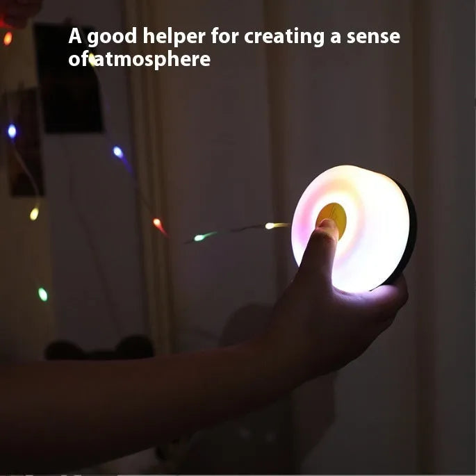 Rechargeable outdoor LED string lights with 30 beads on an 8-metre cord, showing both colourful and warm white light options.