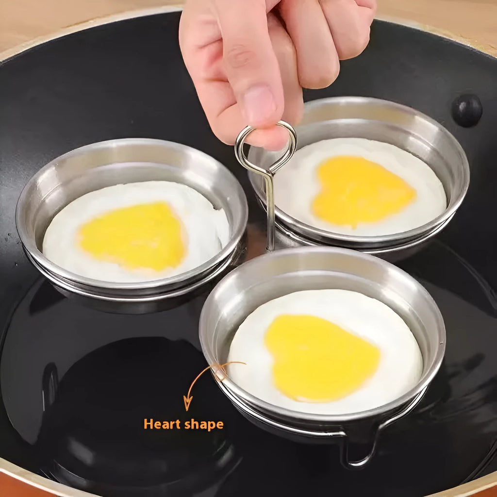 Mini stainless steel egg steamer in heart-shaped and round designs for household kitchen use.