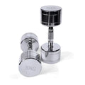 Silver pure steel 1kg dumbbell with ergonomic handle on a grey background.