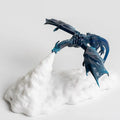 3D-printed red fire-breathing dragon decorative night light on a table