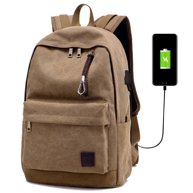 Canvas USB charging backpack in grey colour showing front pockets and side USB port.
