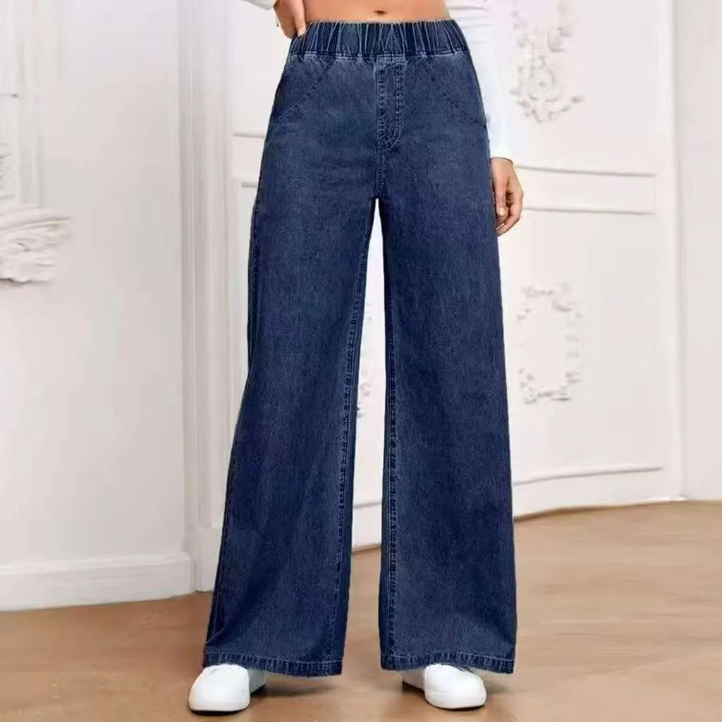 Plus size light blue washed wide-leg denim jeans with straight fit and mid waist design