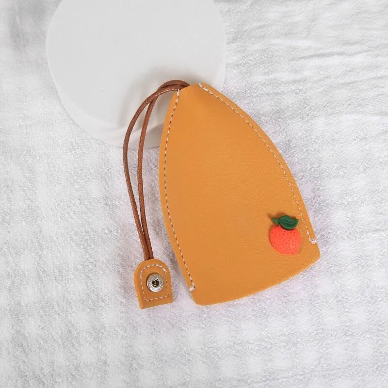 Cartoon pull-out car key case in PU leather with various design options including cactus, rabbit, and fruit themes