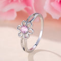 Copper flower hollow fashion ring with platinum pink diamond electroplated finish