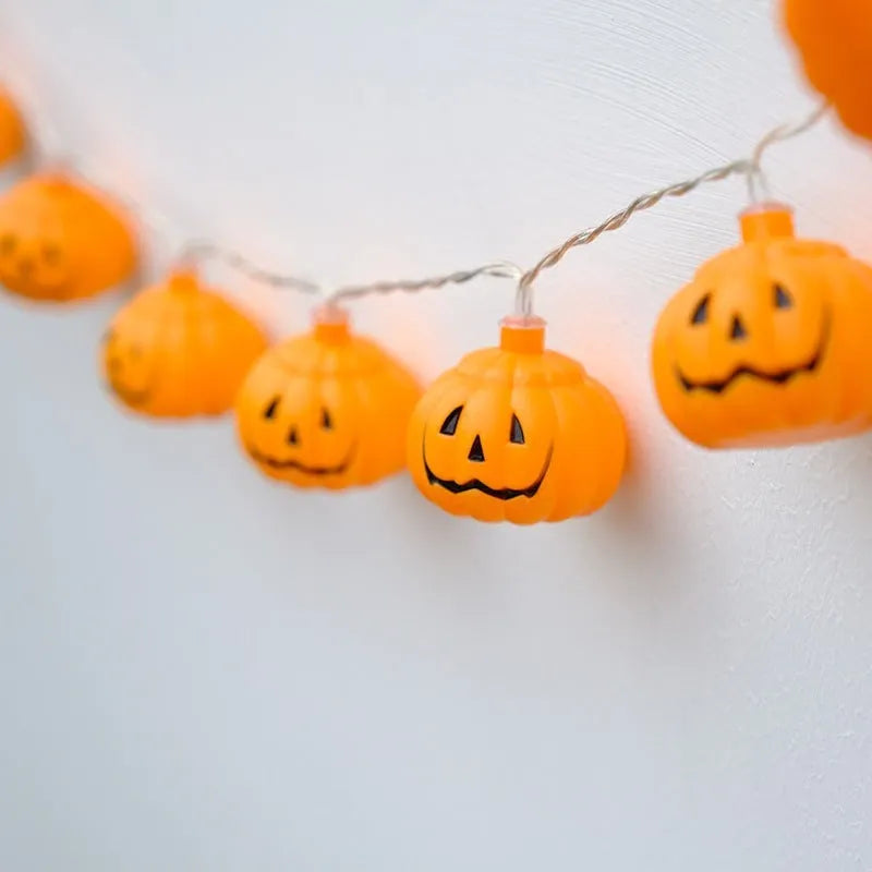 Halloween LED string lights with pumpkin design, 1.5 metre length, battery operated
