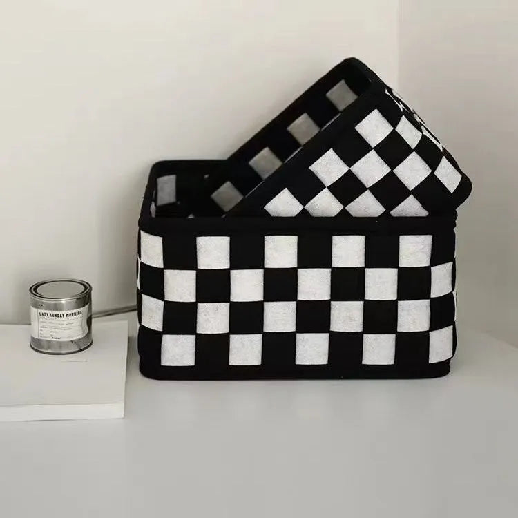 Checkerboard pattern woven felt folding storage basket shown with dimensions 37cm by 29cm by 19.5cm