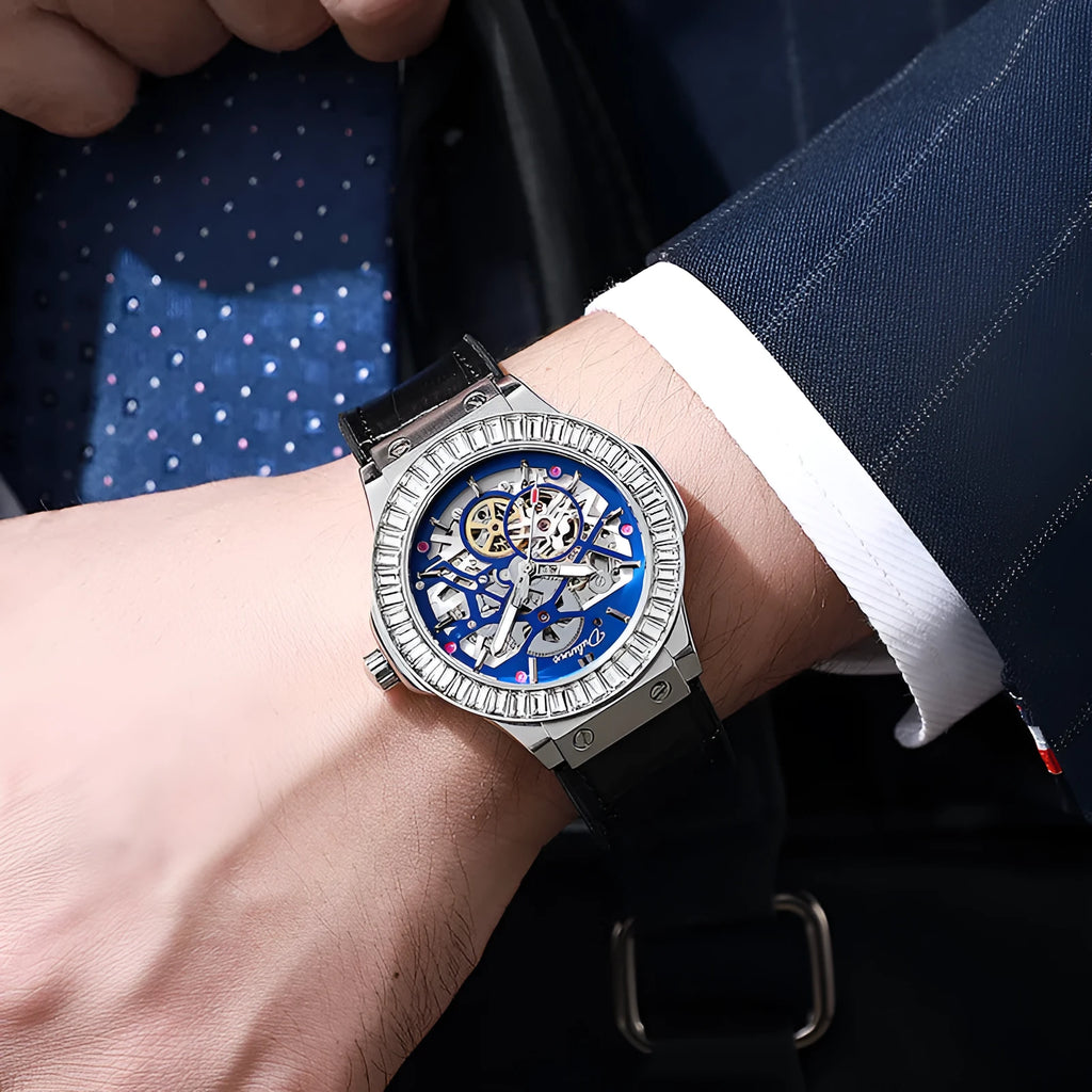 Automatic mechanical men's watch with hollow movement, diamond studs, and a 16mm thick case on a leather strap.