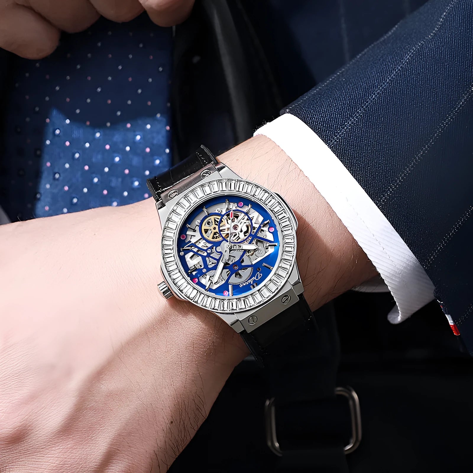 Automatic mechanical men's watch with hollow movement, diamond studs, and a 16mm thick case on a leather strap.