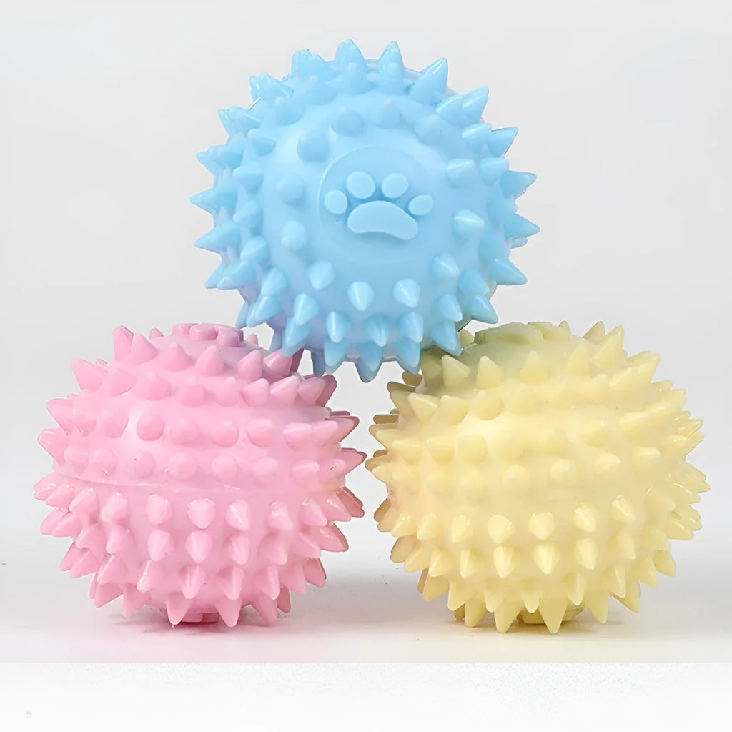 Blue TPR rubber dog toy ball with raised footprint texture for teeth cleaning, 6cm diameter.
